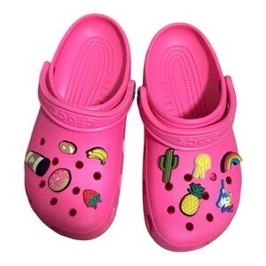Pink Crocs with charms